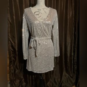 XS silver stretchy button by bust to adjust size